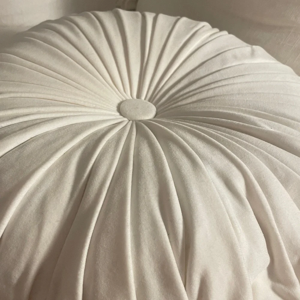 Round white velvet tufted pillow